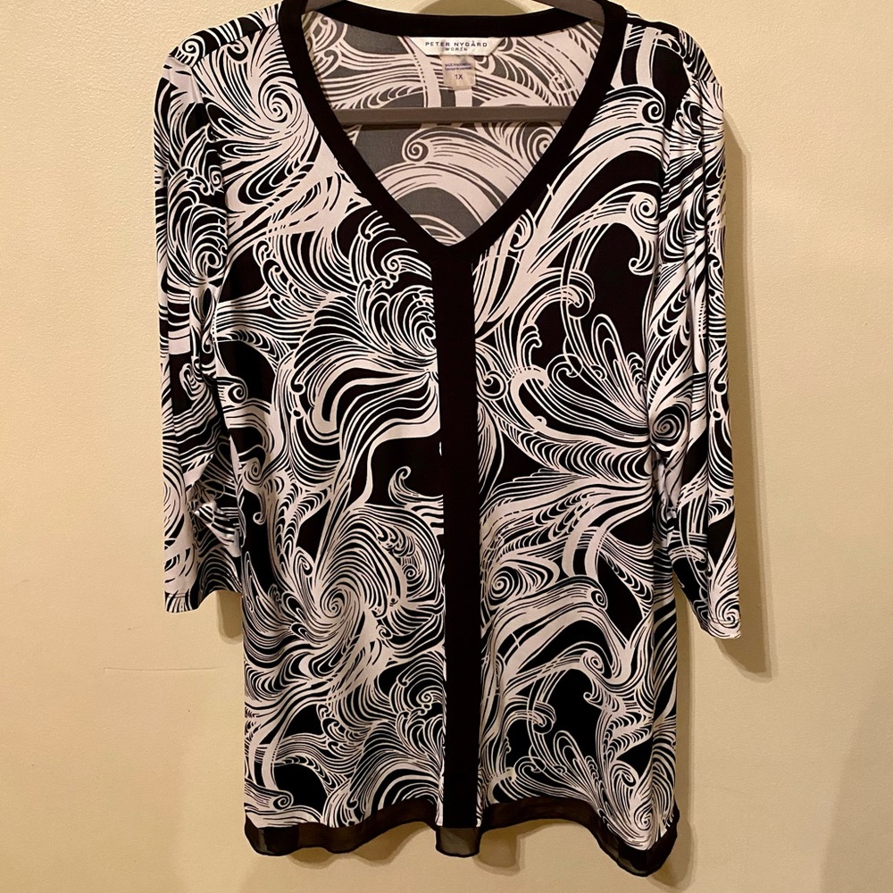 Peter Nygard top